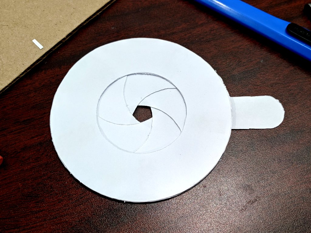 Paper mechanical iris glue