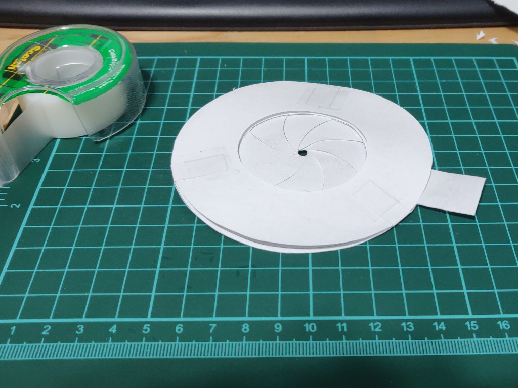 paper iris diaphragm assembly 10