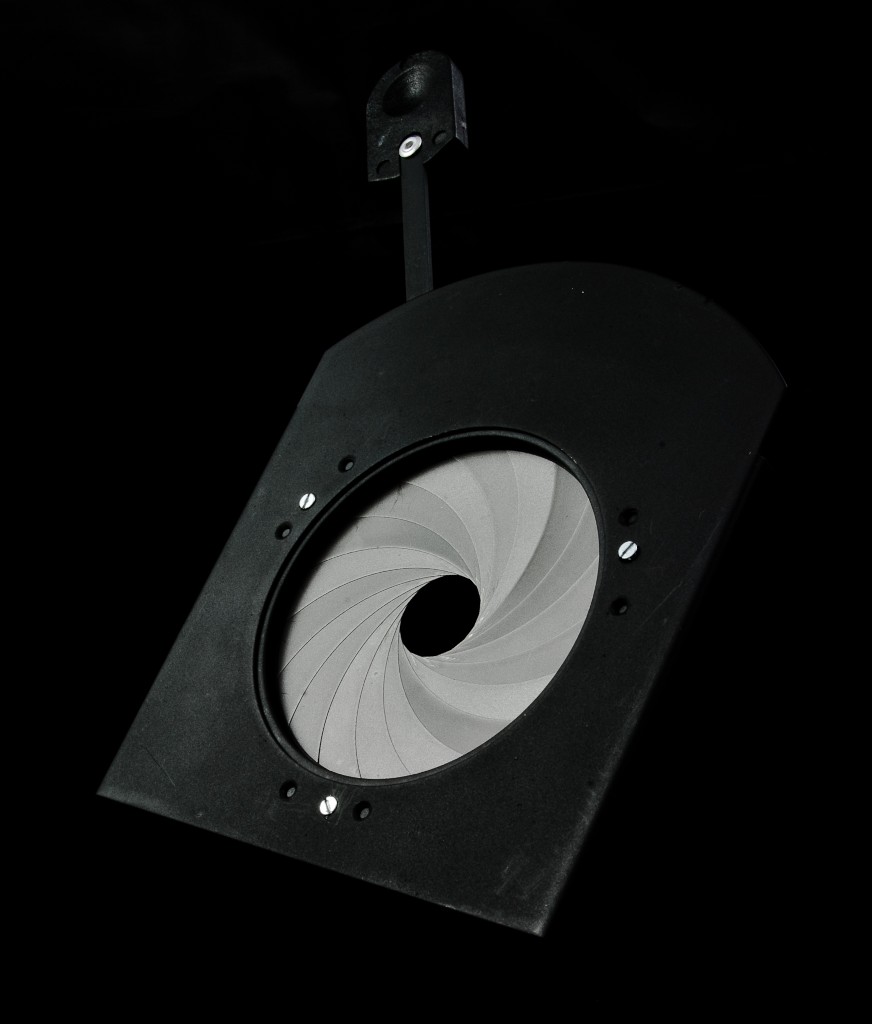 An iris diaphragm for a theatrical spotlight